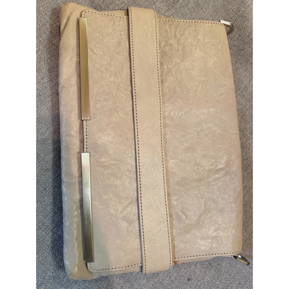 Beautiful Cream leather clutch with detachable shoulder strap by Kenneth Cole
